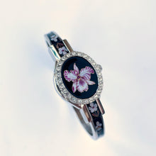 Load image into Gallery viewer, Vintage André Mouche Quartz Watch with Black Enamel Floral Design, Concealead Dial and Silver-Tone Bangle Bracelet
