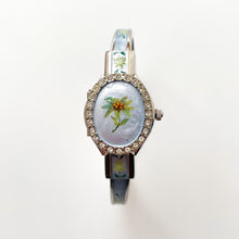 Load image into Gallery viewer, Vintage André Mouche Quartz Watch with Light Blue Enamel Floral Design, Concealed Dial and Silver-Tone Bangle Bracelet
