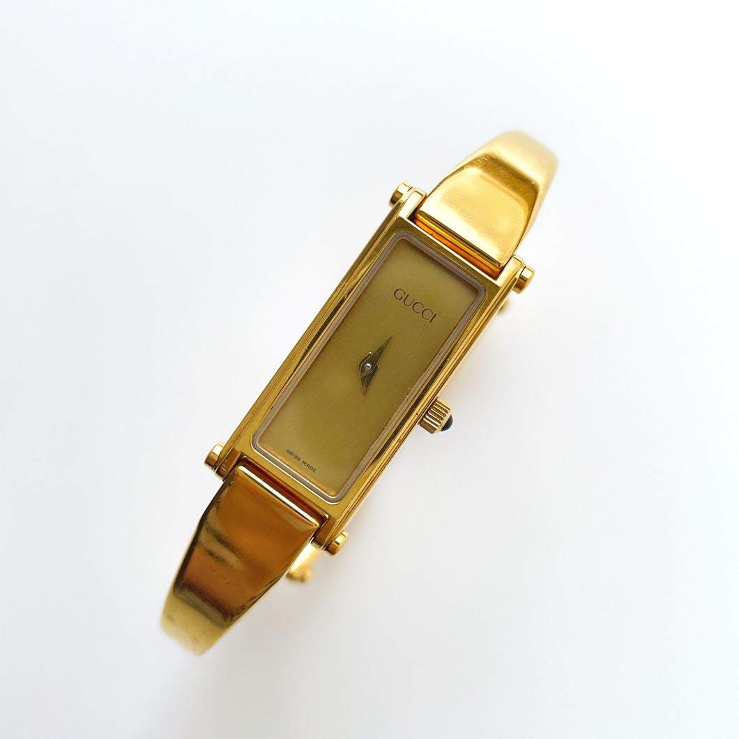 Gold-Tone Gucci Bangle Quartz Watch with Rectangular Dial