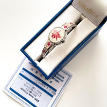 Load image into Gallery viewer, Vintage 1999 André Mouche Quartz Watch with Pink Enamel Floral Design, Concealed Dial and Silver-Tone Bangle Bracelet
