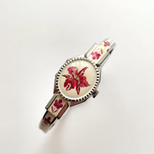 Load image into Gallery viewer, Vintage 1999 André Mouche Quartz Watch with Pink Enamel Floral Design, Concealed Dial and Silver-Tone Bangle Bracelet
