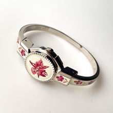 Load image into Gallery viewer, Vintage 1999 André Mouche Quartz Watch with Pink Enamel Floral Design, Concealed Dial and Silver-Tone Bangle Bracelet
