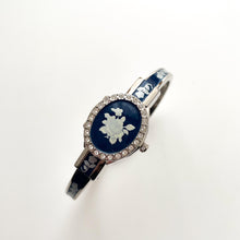 Load image into Gallery viewer, Vintage André Mouche Quartz Watch with Navy Enamel Floral Design, Concealed Dial and Silver-Tone Bangle Bracelet
