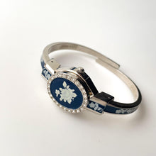 Load image into Gallery viewer, Vintage André Mouche Quartz Watch with Navy Enamel Floral Design, Concealed Dial and Silver-Tone Bangle Bracelet
