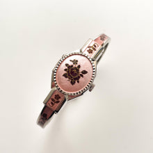 Load image into Gallery viewer, Vintage 1990s André Mouche Quartz Watch with Pink &amp; Burgundy Enamel Floral Design, Concealed Dial and Silver-Tone Bangle Bracelet
