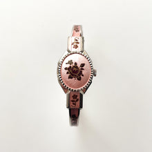 Load image into Gallery viewer, Vintage 1990s André Mouche Quartz Watch with Pink &amp; Burgundy Enamel Floral Design, Concealed Dial and Silver-Tone Bangle Bracelet
