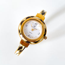 Load image into Gallery viewer, Vintage André Mouche Quartz Watch Set with Interchangeable Bezel, Enamel Design and Gold-Plated Bangle Bracelet
