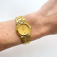 Load image into Gallery viewer, Vintage Gold-Plated Gucci Quartz Watch with Round Dial and Date Window - Boxed
