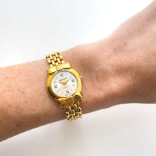 Load image into Gallery viewer, Vintage 1990s Gold-Plated Ladies&#39; Nina Ricci Quartz Watch with Round Mother of Pearl Dial
