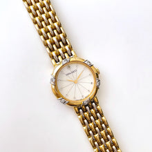 Load image into Gallery viewer, Vintage 1990s Crystal-Set Gold-Plated Ladies&#39; Nina Ricci Quartz Watch with Round Mother of Pearl Dial
