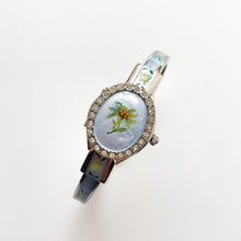 Load image into Gallery viewer, Vintage André Mouche Quartz Watch with Light Blue Enamel Floral Design, Concealed Dial and Silver-Tone Bangle Bracelet
