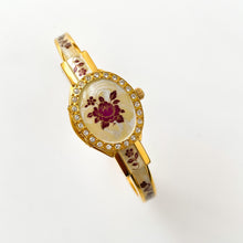 Load image into Gallery viewer, Vintage André Mouche Quartz Watch with Enamel Floral Design, Concealed Dial and Gold-Plated Bangle Bracelet
