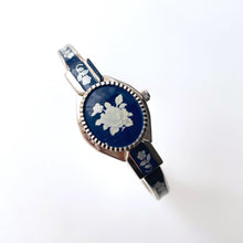 Load image into Gallery viewer, Vintage André Mouche Quartz Watch with Navy Enamel Floral Design, Concealed Dial and Silver-Tone Bangle Bracelet
