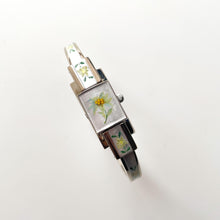 Load image into Gallery viewer, Vintage 1999 André Mouche Quartz Watch with Enamel Floral Design, Concealed Dial and Stainless Steel Bangle Bracelet
