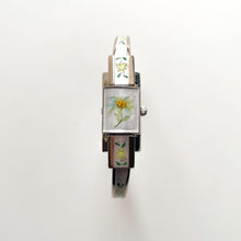 Load image into Gallery viewer, Vintage 1999 André Mouche Quartz Watch with Enamel Floral Design, Concealed Dial and Stainless Steel Bangle Bracelet
