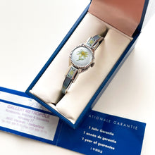 Load image into Gallery viewer, Vintage 1998 André Mouche Quartz Watch with Light Blue Enamel Floral Design, Concealed Dial and Silver-Tone Bangle Bracelet
