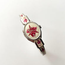 Load image into Gallery viewer, Vintage 1999 André Mouche Quartz Watch with Pink Enamel Floral Design, Concealed Dial and Silver-Tone Bangle Bracelet
