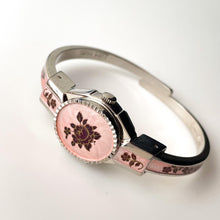 Load image into Gallery viewer, Vintage 1990s André Mouche Quartz Watch with Pink &amp; Burgundy Enamel Floral Design, Concealed Dial and Silver-Tone Bangle Bracelet
