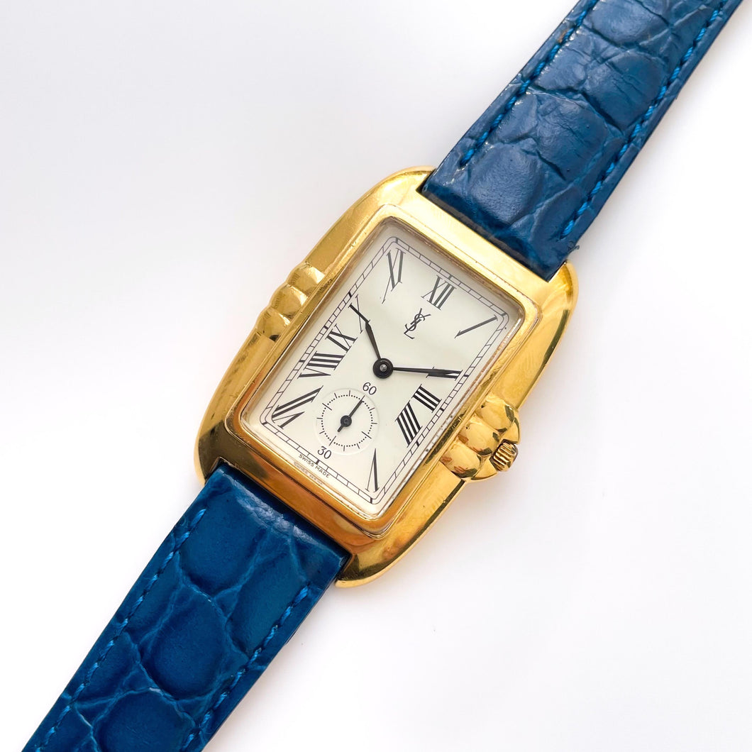 Vintage 90s Gold-Plated Yves Saint Laurent Unisex Tank-Style Quartz Watch with Blue Leather Strap