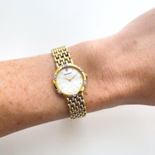 Load image into Gallery viewer, Vintage 1990s Crystal-Set Gold-Plated Ladies&#39; Nina Ricci Quartz Watch with Round Mother of Pearl Dial
