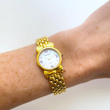 Load image into Gallery viewer, Vintage 1990s Gold-Plated Ladies&#39; Nina Ricci Quartz Watch with Round Mother of Pearl Dial
