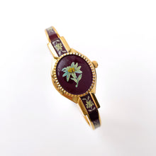 Load image into Gallery viewer, Vintage André Mouche Quartz Watch with Burgundy Enamel Floral Design, Concealead Dial and Gold-Plated Bangle Bracelet
