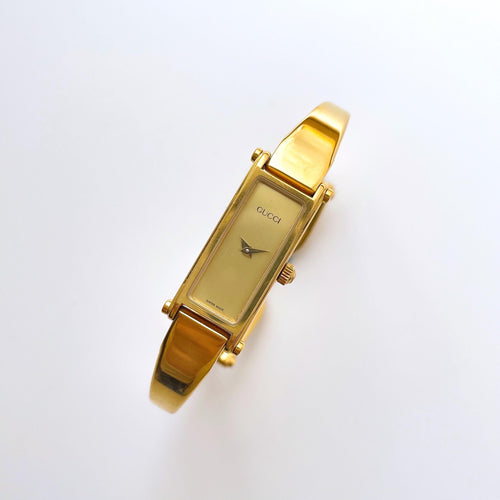 Vintage Ladies' Gold-Plated Gucci Bangle Quartz Watch with Rectangular Dial