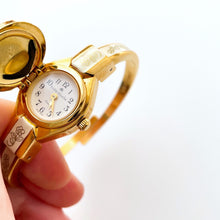 Load image into Gallery viewer, Vintage André Mouche Quartz Watch with Enamel Floral Design, Concealed Dial and Gold-Plated Bangle Bracelet
