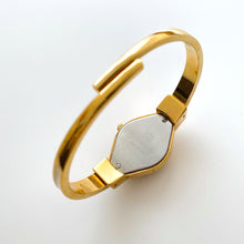 Load image into Gallery viewer, Vintage André Mouche Quartz Watch with Enamel Floral Design, Concealed Dial and Gold-Plated Bangle Bracelet
