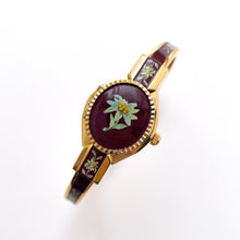 Load image into Gallery viewer, Vintage André Mouche Quartz Watch with Burgundy Enamel Floral Design, Concealead Dial and Gold-Plated Bangle Bracelet
