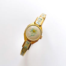 Load image into Gallery viewer, Vintage 1999 André Mouche Quartz Watch with Enamel Floral Design, Concealed Dial and Gold-Plated Bangle Bracelet
