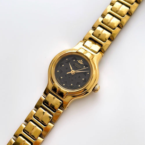 Vintage 00s Gold-Plated Ladies' Seiko Quartz Watch with Black Dial and Thin Bracelet