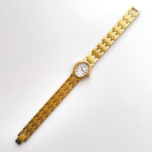 Load image into Gallery viewer, Vintage 1990s Gold-Plated Ladies&#39; Seiko Quartz Watch with White Oval Dial and Roman Numerals
