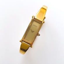 Load image into Gallery viewer, Vintage Ladies&#39; Gold-Plated Gucci 1500 Bangle Quartz Watch with Gold Rectangular Dial
