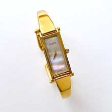 Load image into Gallery viewer, Vintage 1998 Ladies&#39; Gold-Plated Gucci 1500L Bangle Quartz Watch with Rectangular Mother of Pearl Dial
