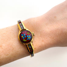 Load image into Gallery viewer, Vintage Chandler Peek-a-Boo Quartz Watch with Metallic Red Enamel Floral Design, Concealed Dial and Gold-Plated Bangle Bracelet
