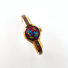 Load image into Gallery viewer, Vintage Chandler Peek-a-Boo Quartz Watch with Metallic Red Enamel Floral Design, Concealed Dial and Gold-Plated Bangle Bracelet
