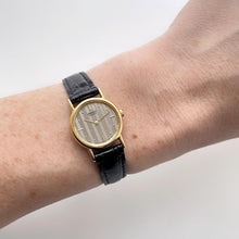 Load image into Gallery viewer, Vintage Gold-Plated Ladies&#39; Seiko Quartz Watch with Striped Dial and Black Leather Strap
