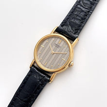 Load image into Gallery viewer, Vintage Gold-Plated Ladies&#39; Seiko Quartz Watch with Striped Dial and Black Leather Strap
