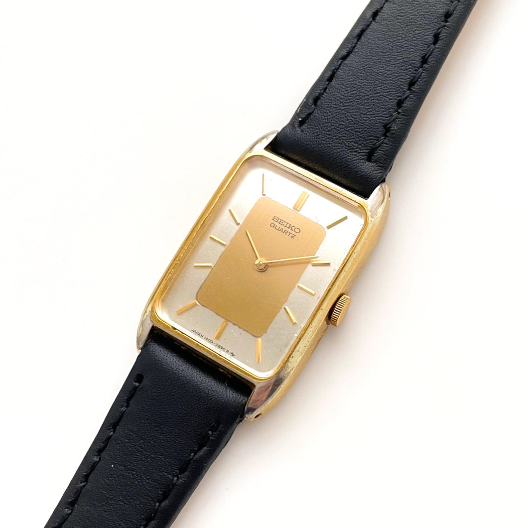 Vintage Gold-Plated Ladies' Seiko Quartz Watch with Rectangular Tank Dial and Black Leather Strap