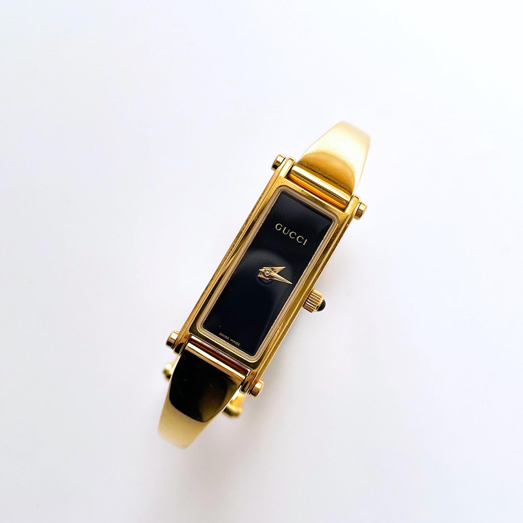 Vintage Ladies' Gold-Plated Gucci 1500L Bangle Quartz Watch with Black Rectangular Dial