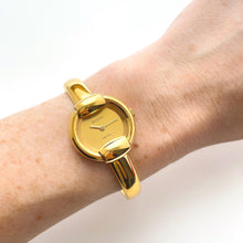 Load image into Gallery viewer, 90s Gold-Plated Gucci 1400L Bangle Quartz Watch with Horsebit Design
