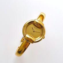 Load image into Gallery viewer, 90s Gold-Plated Gucci 1400L Bangle Quartz Watch with Horsebit Design
