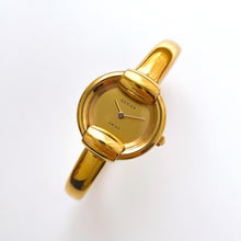 Load image into Gallery viewer, 90s Gold-Plated Gucci 1400L Bangle Quartz Watch with Horsebit Design
