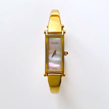 Load image into Gallery viewer, Vintage 1998 Ladies&#39; Gold-Plated Gucci 1500L Bangle Quartz Watch with Rectangular Mother of Pearl Dial
