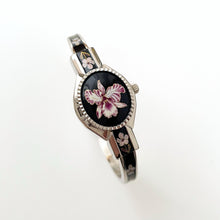 Load image into Gallery viewer, Vintage André Mouche Quartz Watch with Black &amp; Purple Enamel Floral Design, Concealed Dial and Silver-Tone Bangle Bracelet
