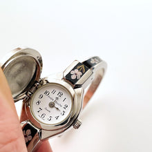 Load image into Gallery viewer, Vintage André Mouche Quartz Watch with Black &amp; Purple Enamel Floral Design, Concealed Dial and Silver-Tone Bangle Bracelet
