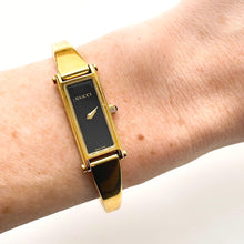 Load image into Gallery viewer, Vintage Ladies&#39; Gold-Plated Gucci 1500L Bangle Quartz Watch with Black Rectangular Dial
