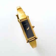 Load image into Gallery viewer, Vintage Ladies&#39; Gold-Plated Gucci 1500L Bangle Quartz Watch with Black Rectangular Dial
