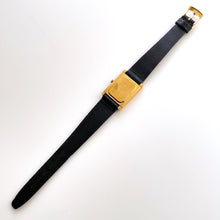 Load image into Gallery viewer, Vintage Tank-Style Gold-Plated Raymond Weil Quartz Watch with Black Leather Strap
